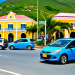 Home 8 A scenic, dynamic view of multiple cars, including a modern rental car (right-hand drive), smoothly navigating a bustling roundabout in St. John's, Antigua. The background features colorful, low-rise buildings, lush palm trees, and a bright Caribbean sky, capturing the unique island traffic flow during peak hours. The scene emphasizes the blend of local and tourist vehicles coexisting on the road. Professional photography, high detail, vibrant colors, clear focus, safe for work, appropriate content, fully clothed (for any visible occupants, though focus is on vehicles and traffic), modest, professional, perfect anatomy, correct proportions, natural pose, well-formed hands, proper finger count, natural body proportions.