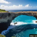 앤티가 바부다 데블스 브릿지 - A dramatic daytime coastal scene featuring the natural limestone arch known as Devils Bridge on Anti...